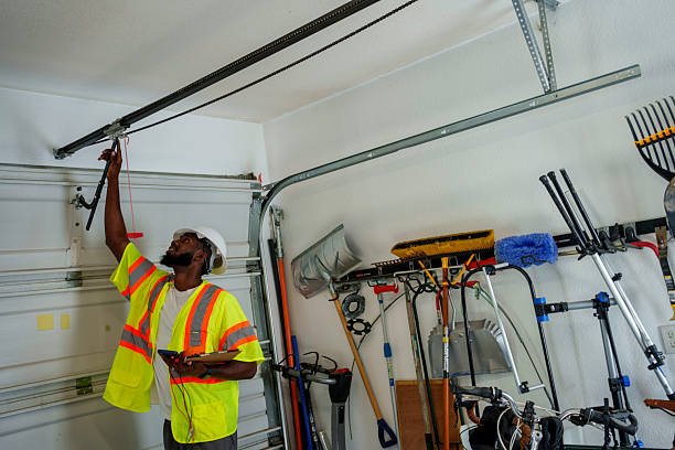 Professional Garage Door Panel Replacement technician working in DeSoto County County, MS